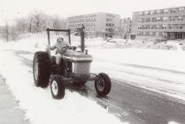 Tractor clearing snow on College Hill